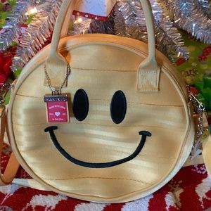 Harvey’s Seatbelt Collector’s Ed Smiley Face Purse
